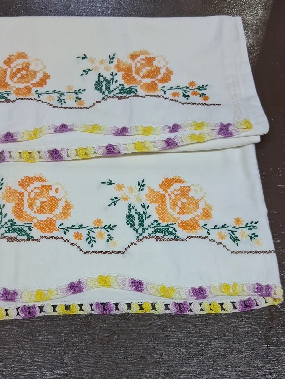 Vintage cross stitched floral Pillowcases with‎ lavendar & yellow Crocheted Lace